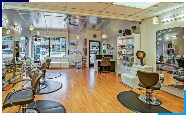 Specialized cleaning team rejuvenating a stylish salon and spa space.